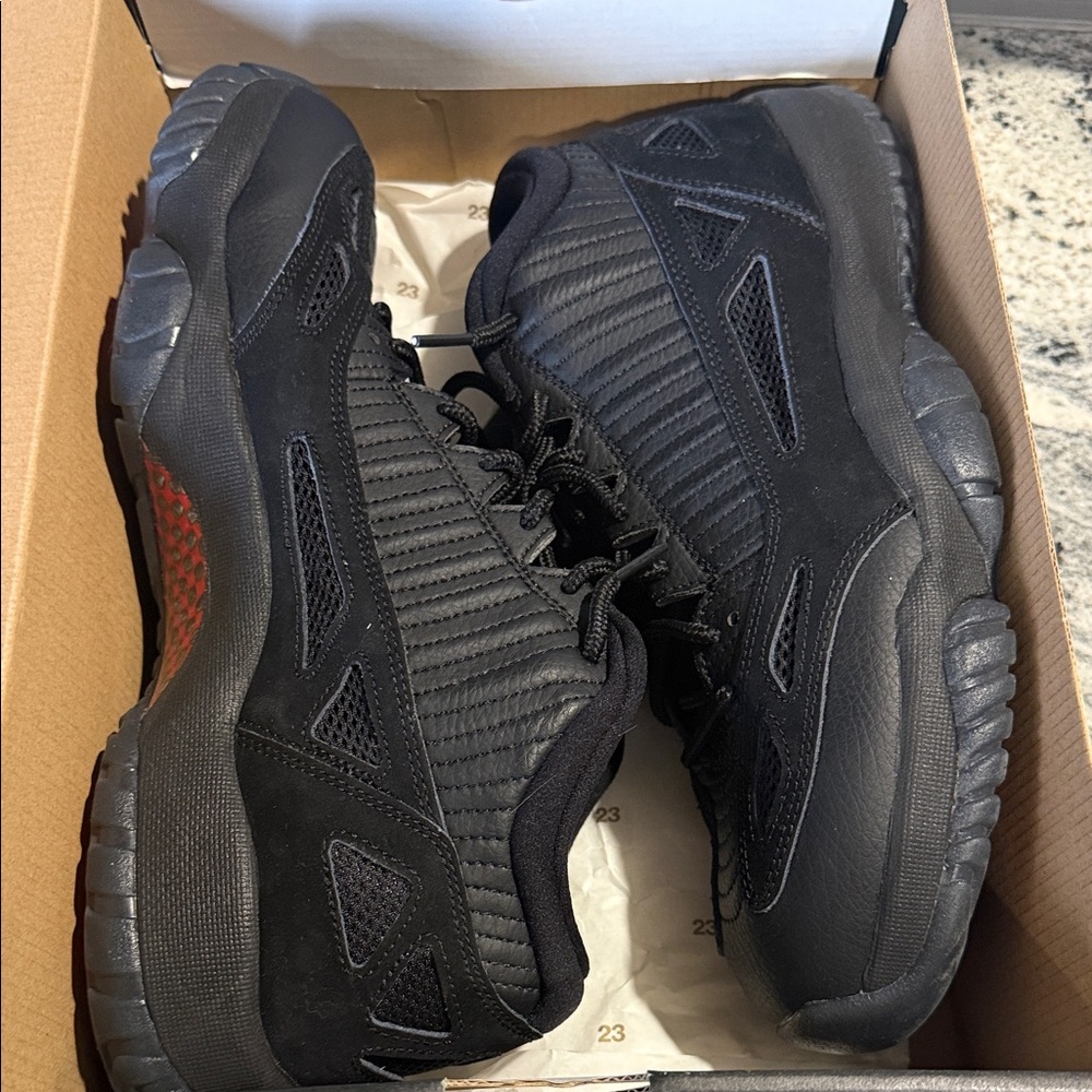 Jordan 11 Retro Low IE “Referee” Suede Black and Red Sneakers
